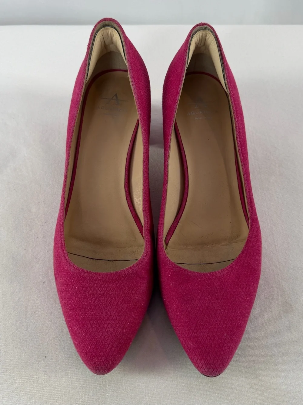 Aquatalia complements heel block
