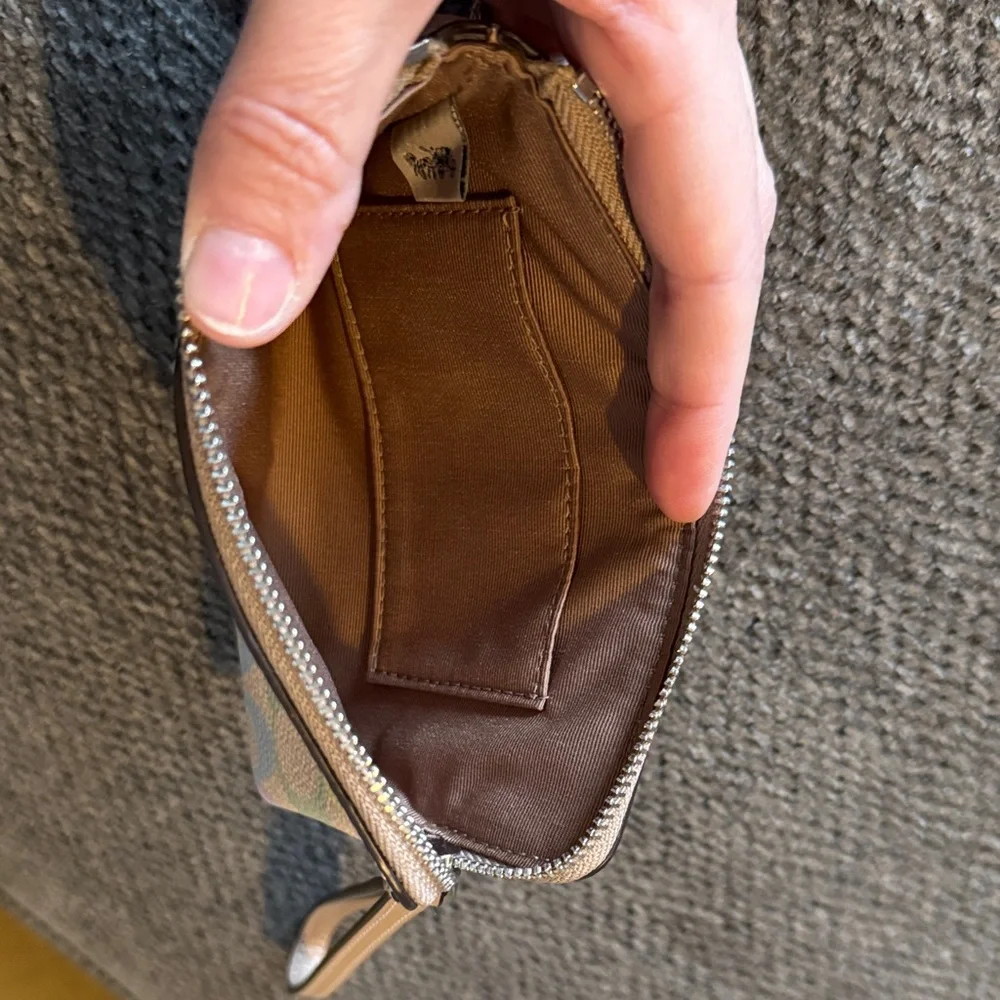 Coach exterior zip