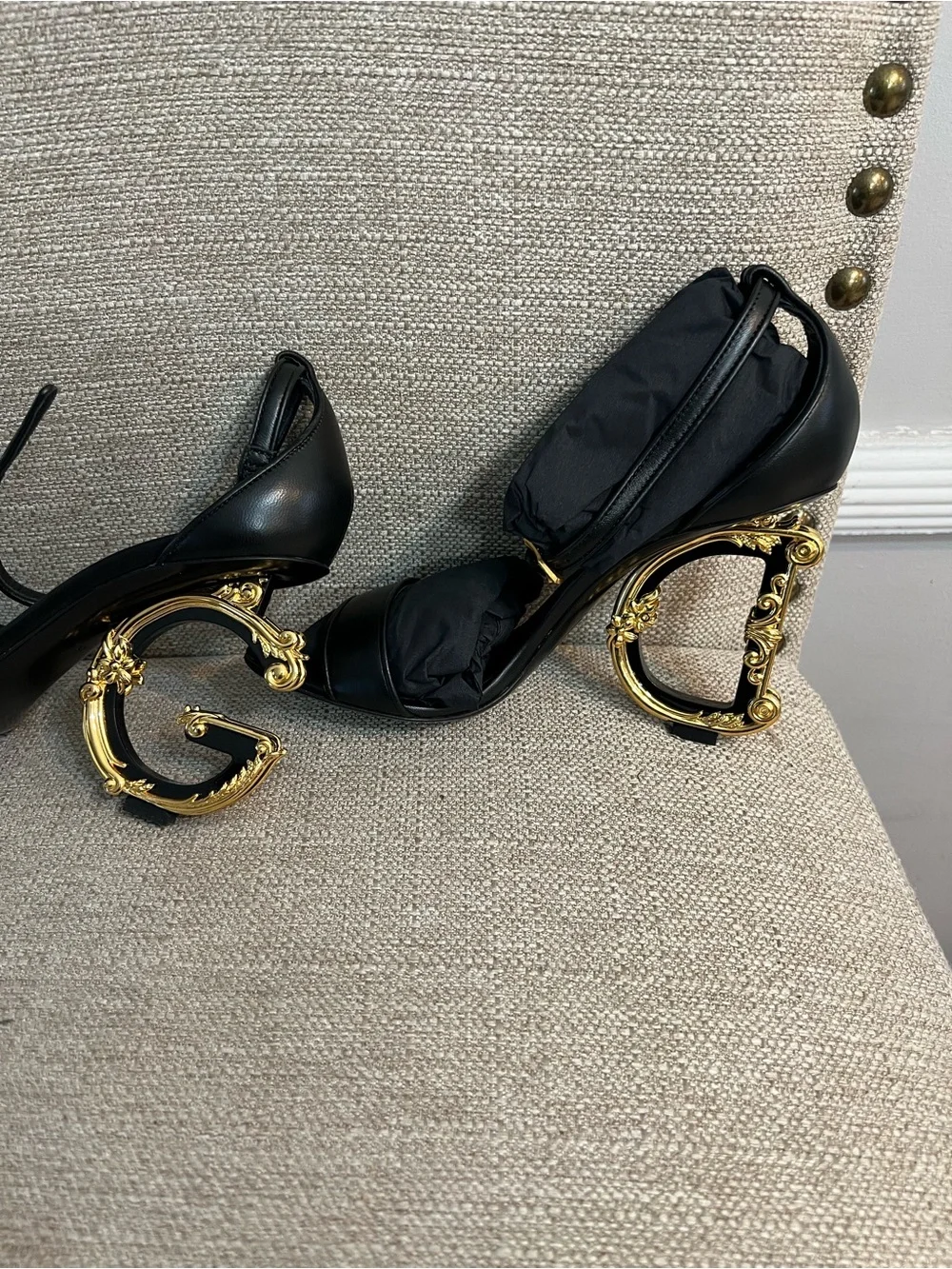 Dolce & Gabbana Black Leather Sandals with Ornate Gold Scroll Heels