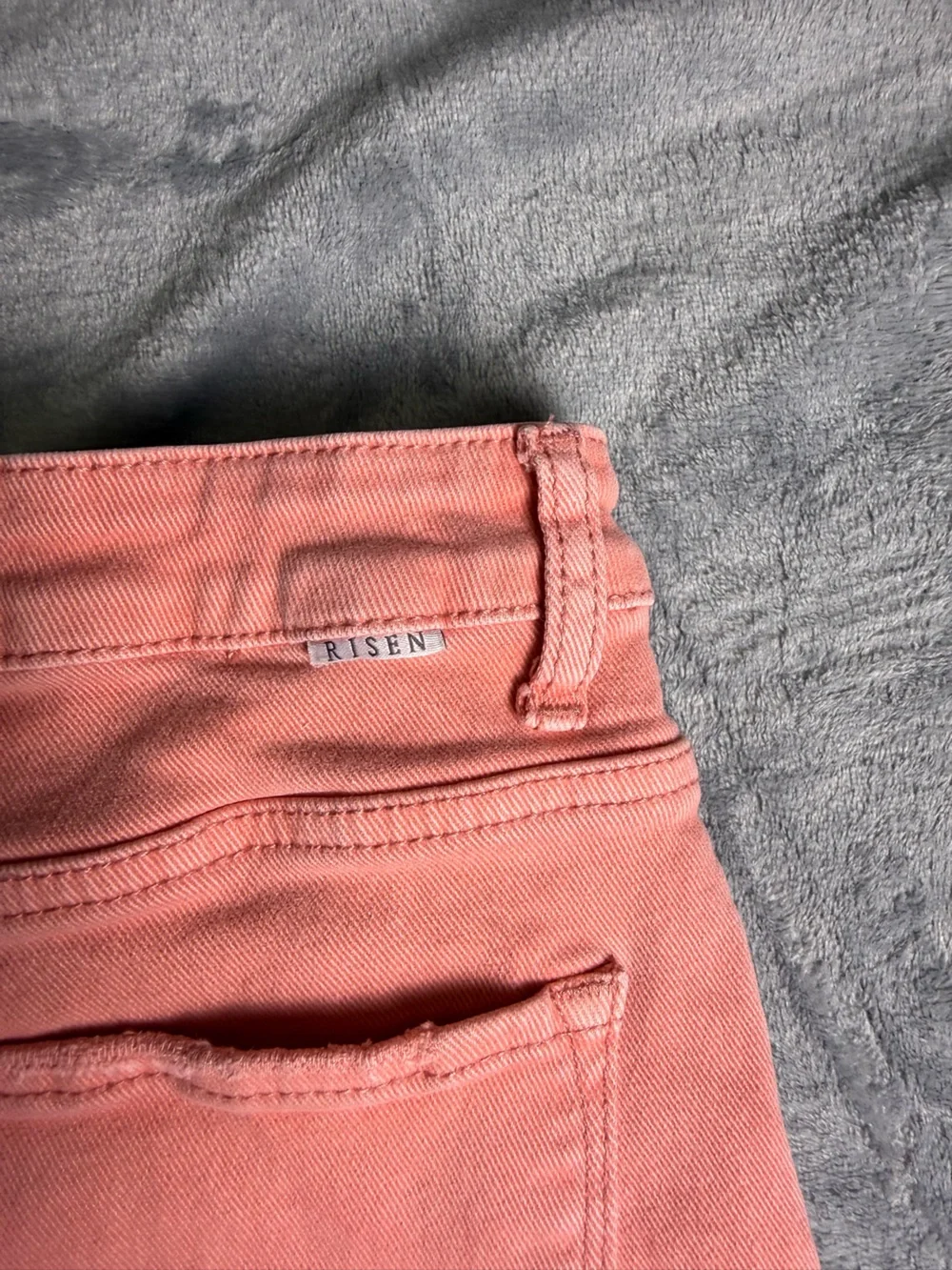 Risen Women’s High Rise Distressed Asymmetrical Coral Jean Shorts- Medium