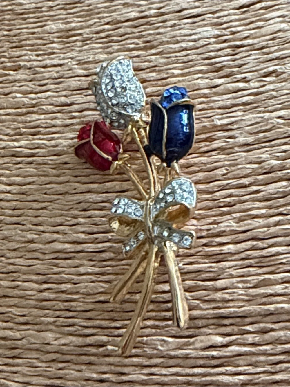 Red white and blue crystal roses bouquet with a pave crystal bow brooch