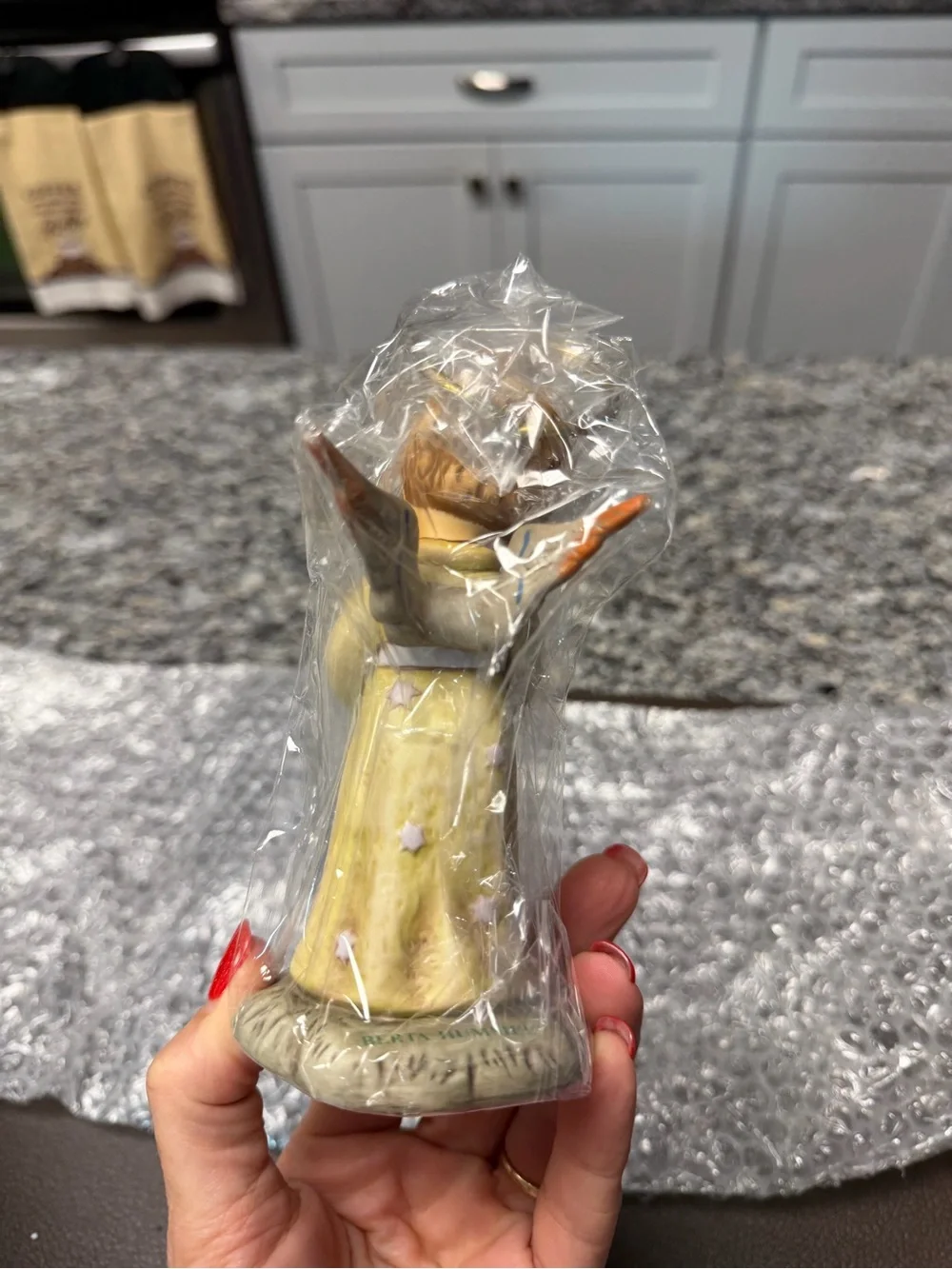 Hummel Praying Angel Figurine in Pale Green and Gold Halo