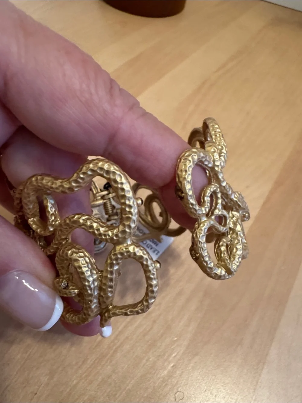 NWT textured gold tone entwined multi-snake clamper bracelet w/white crystal eye