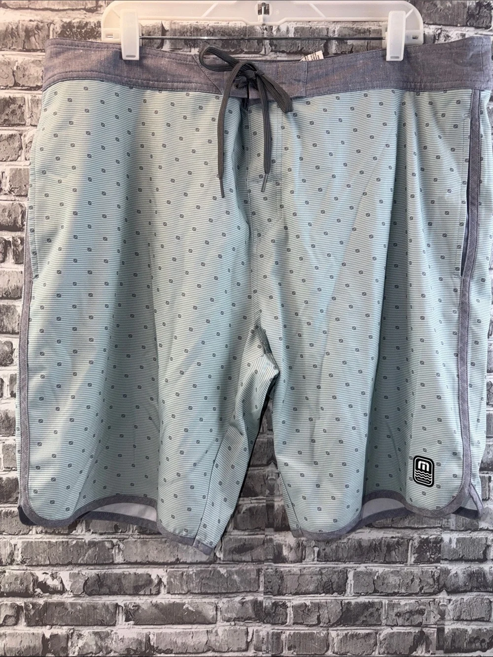 Travis Mathew light teal
