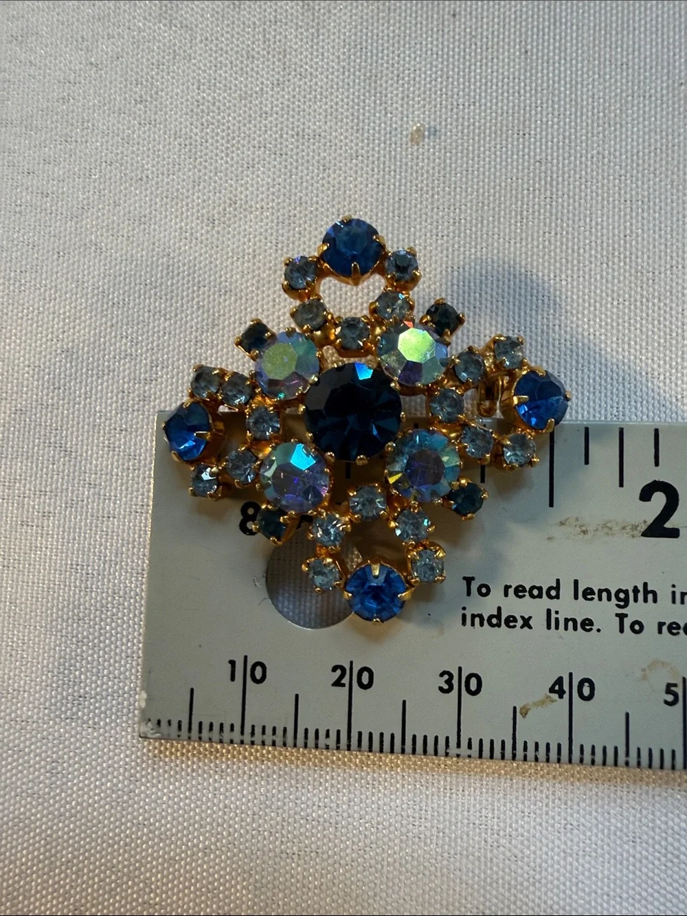Vintage Star Brand Austrian stones Gold-Tone Blue Crystal Floral Brooch Guc 1.5”