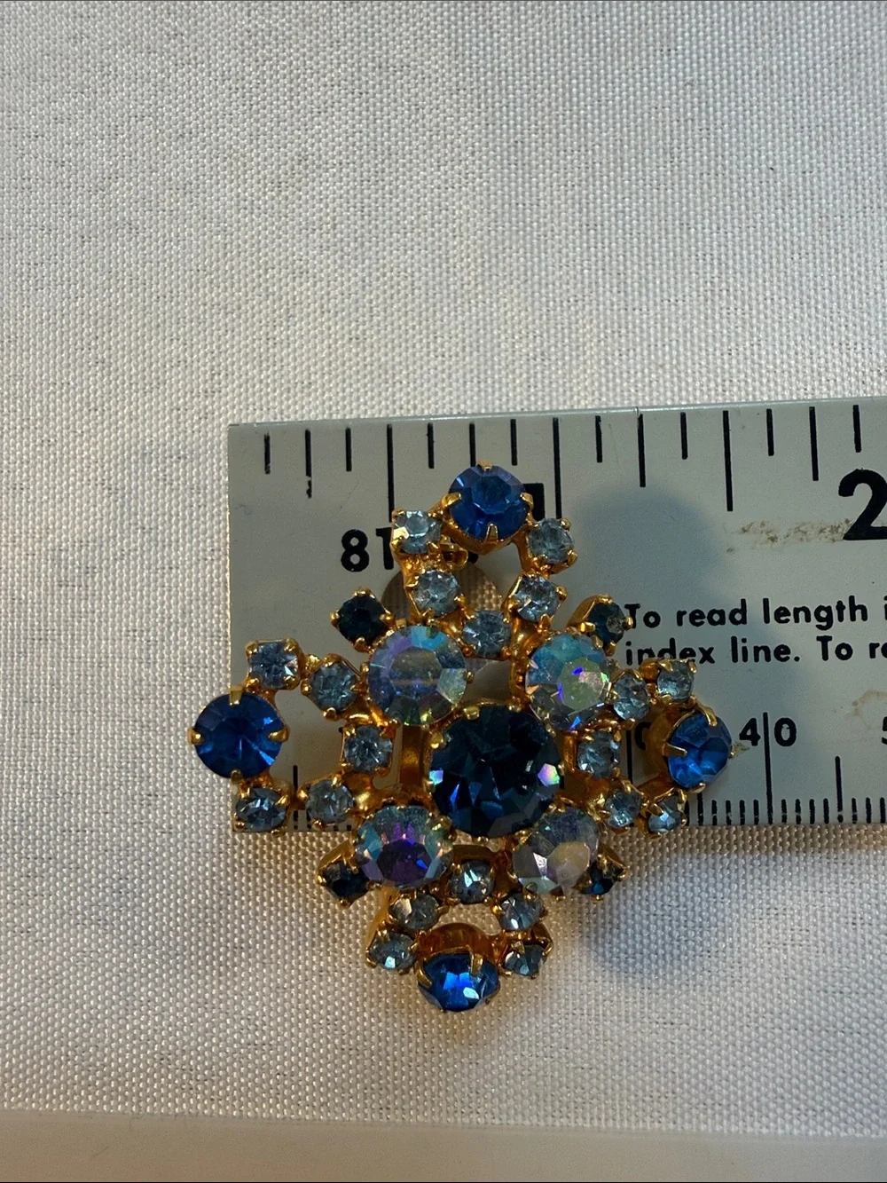 Vintage Star Brand Austrian stones Gold-Tone Blue Crystal Floral Brooch Guc 1.5”