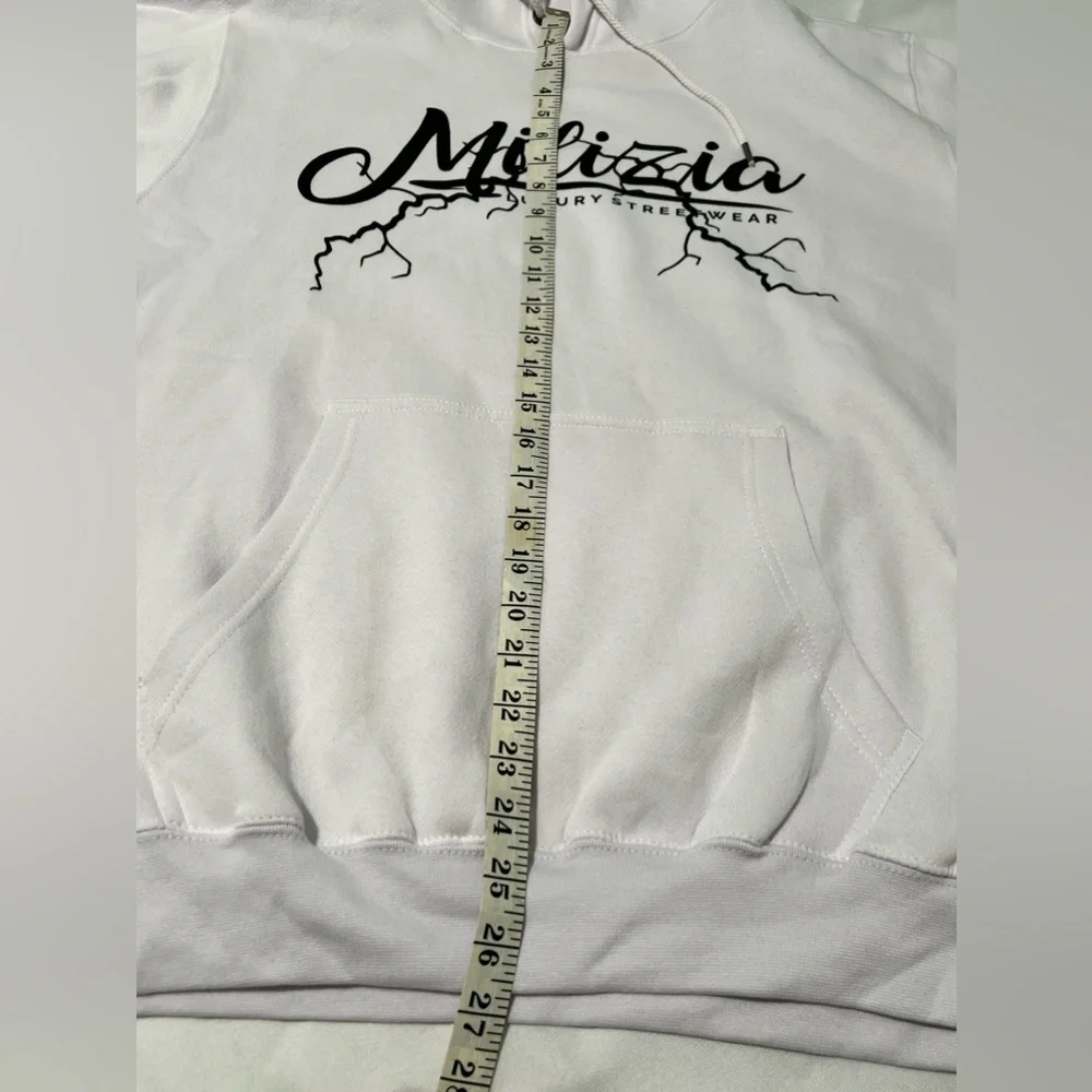 Zuni Sportswear sleeve “against size