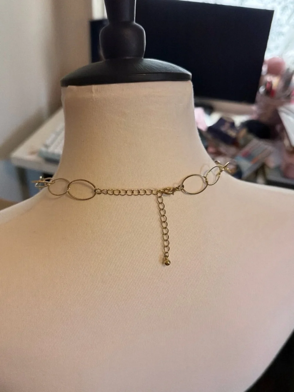 Long Gold Multi-Chain Oval Necklace with Bead Accents
