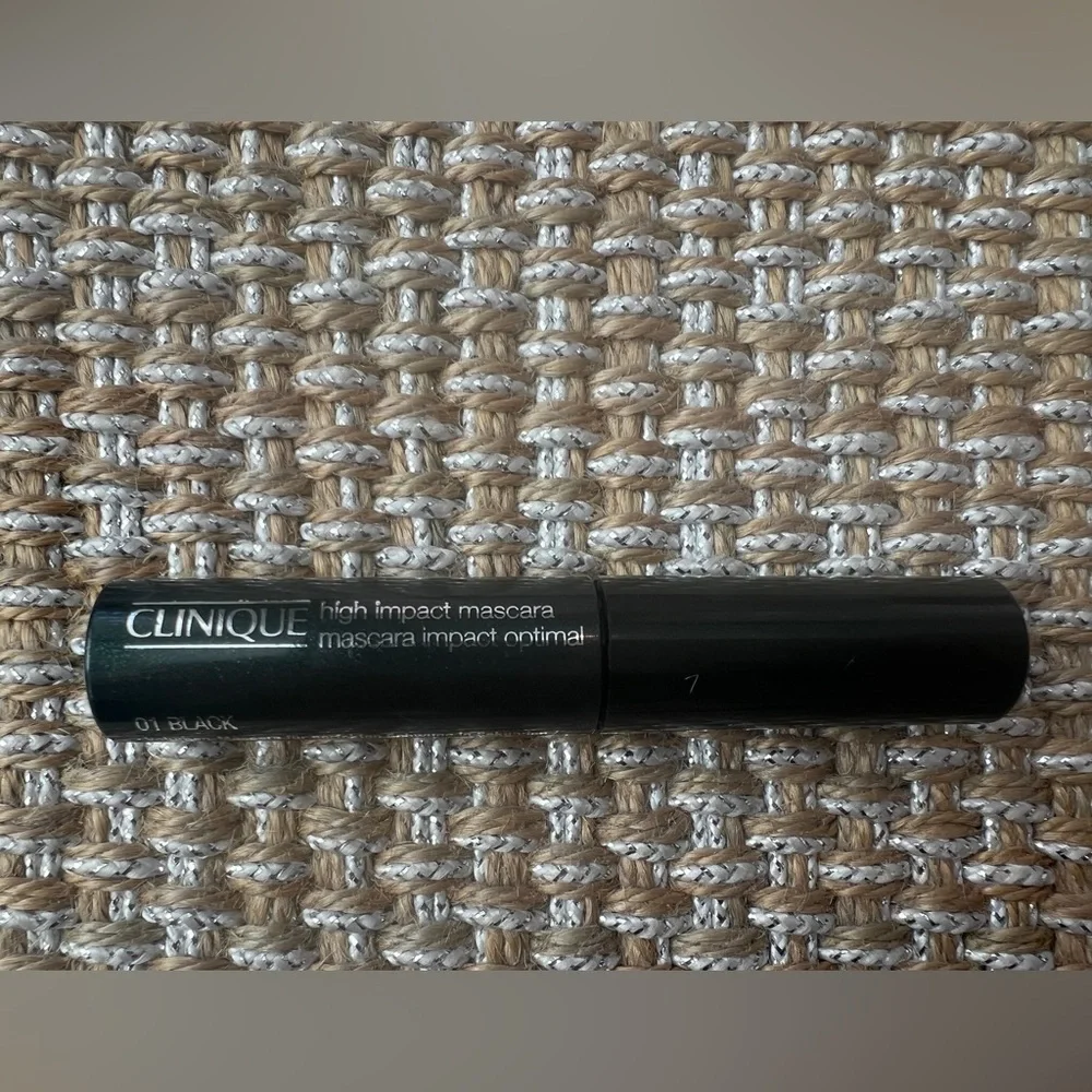 Clinique cosmetic makeup collection - bag, mascara, eyeliner, and makeup remover