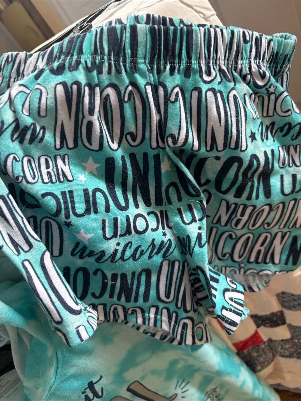 Bundle of 2 PJ’s Justice Turquoise Unicorn Hooded Pajama Set and one other set.