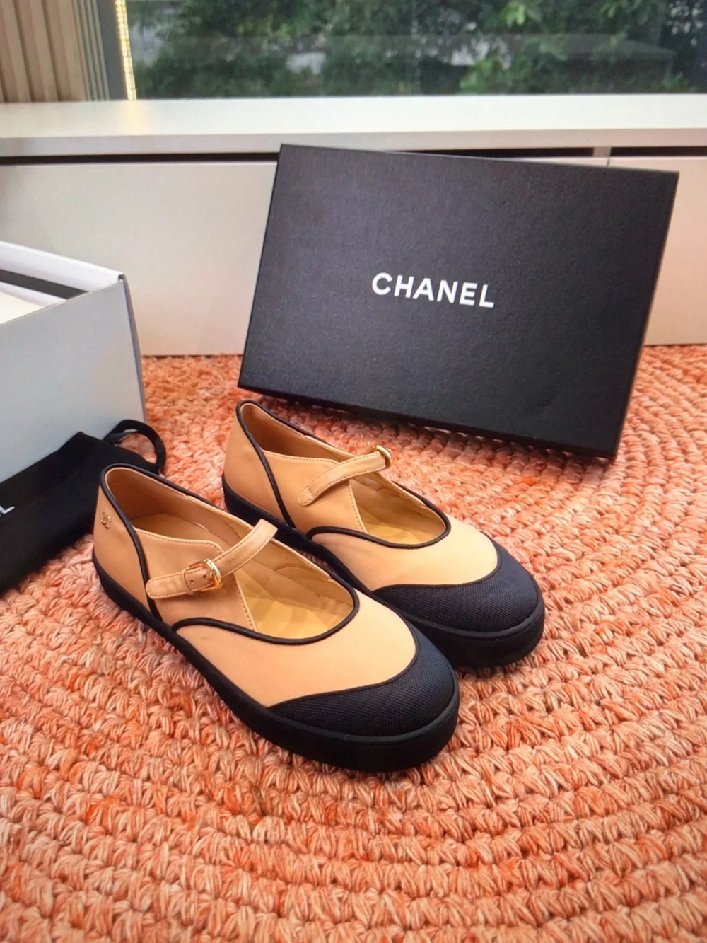 CHANEL Beige and Black Mary Jane Flats with Gold Buckle