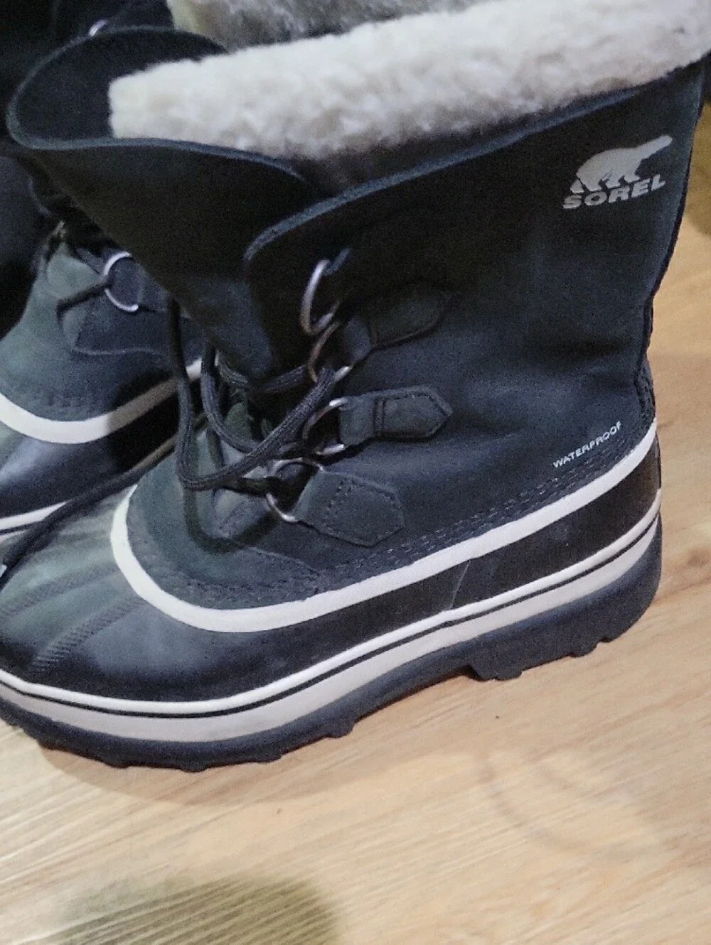 Sorel Black Leather Winter Boot with Cream Shearling Collar