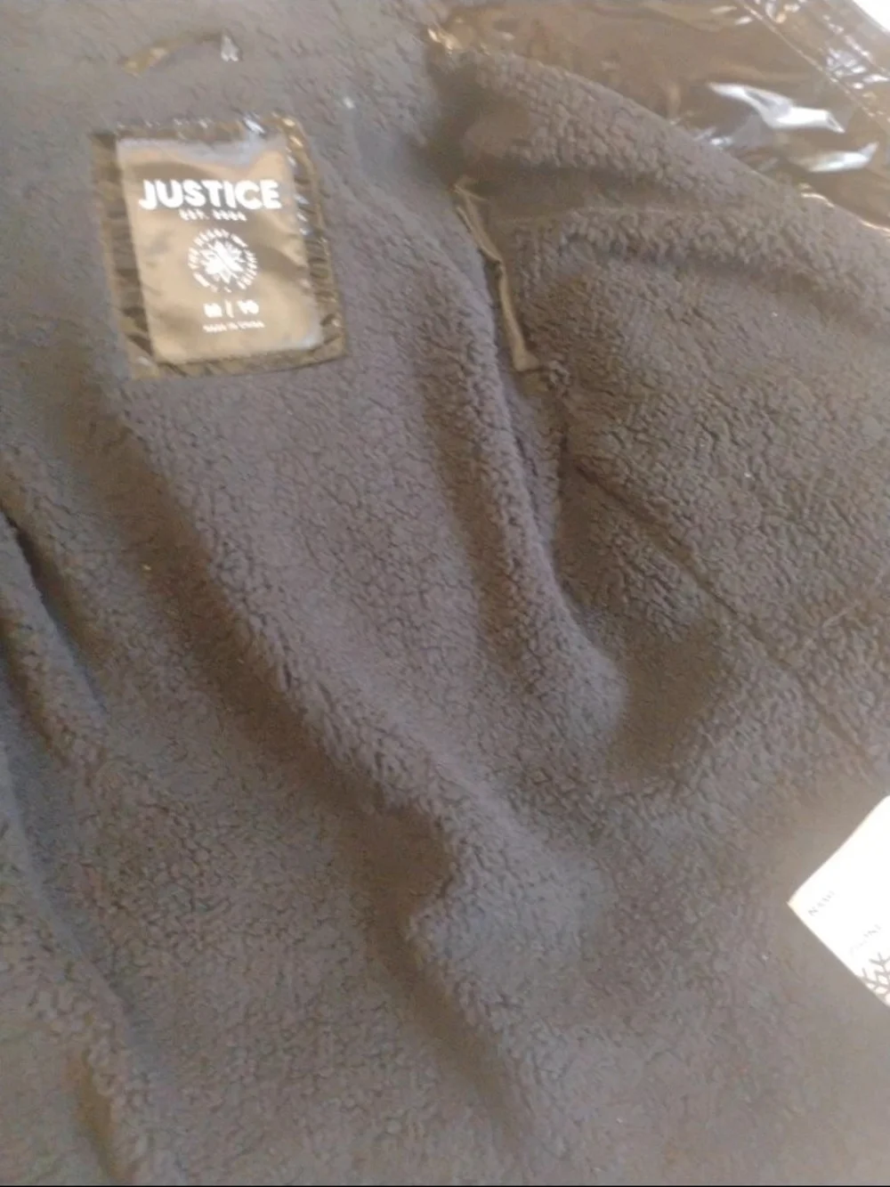 Justice glossy black