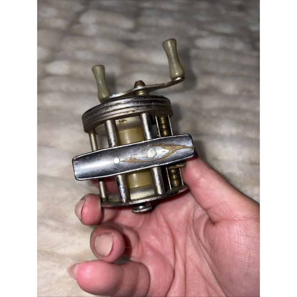 Vintage J.C. Higgins Fishing Reel Engraved Fisherman Fish Baitcaster 312.3184