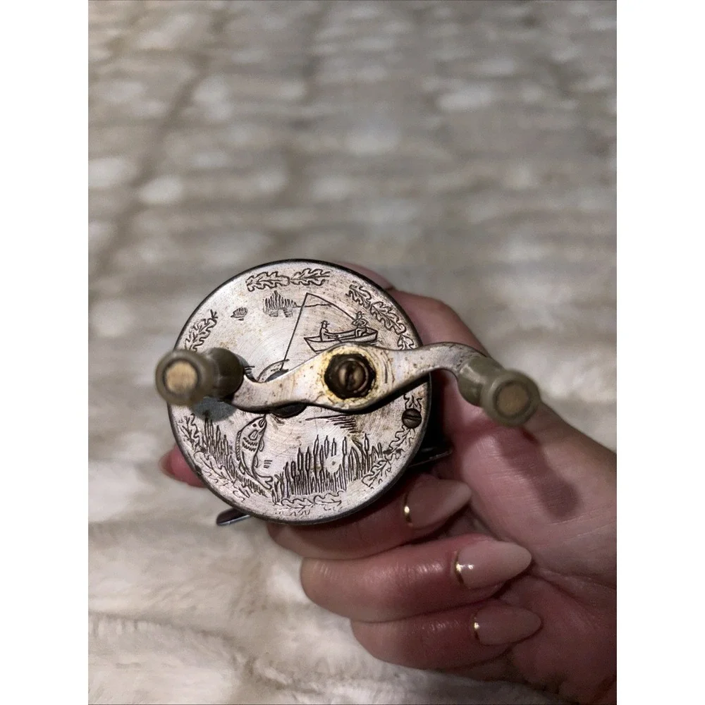 Vintage J.C. Higgins Fishing Reel Engraved Fisherman Fish Baitcaster 312.3184