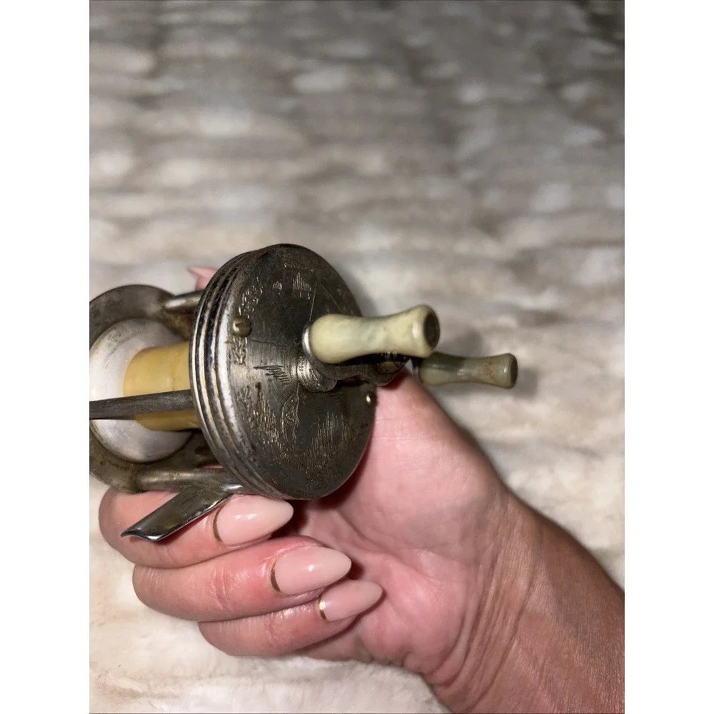 Vintage J.C. Higgins Fishing Reel Engraved Fisherman Fish Baitcaster 312.3184