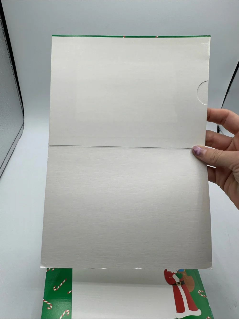 Lillian Vernon rips envelopes greeting