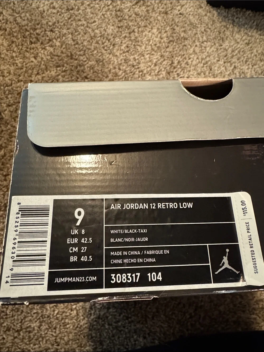 Jordan White Black Low-Top Sneakers with Gold Accents