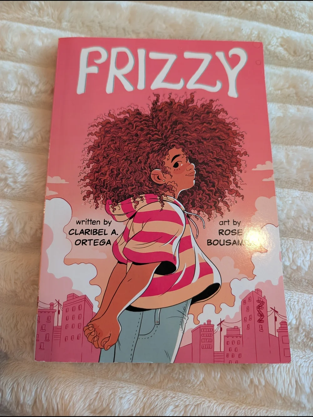 Frizzy by Claribel A. Ortega is a middle-grade graphic novel