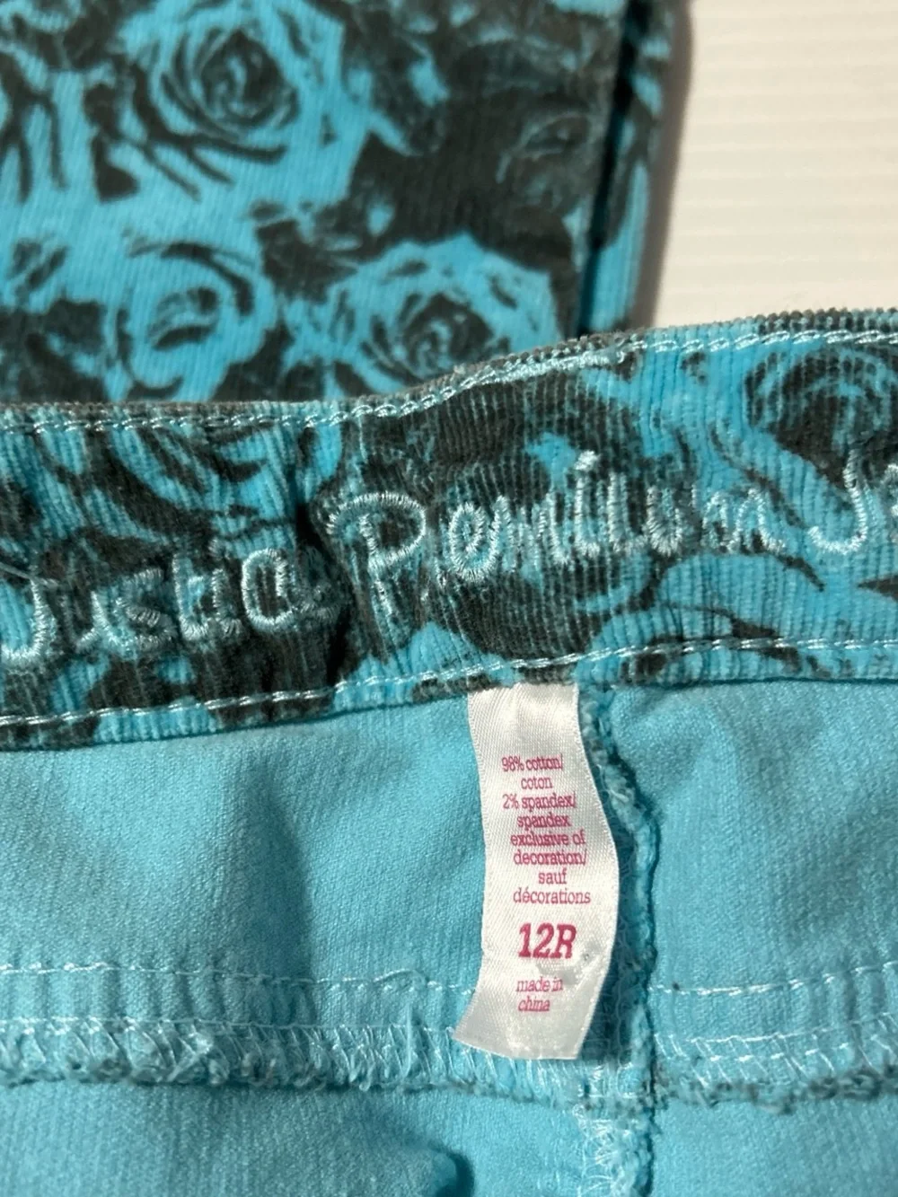 Justice Girls Teal and Black Rose Print Jeans