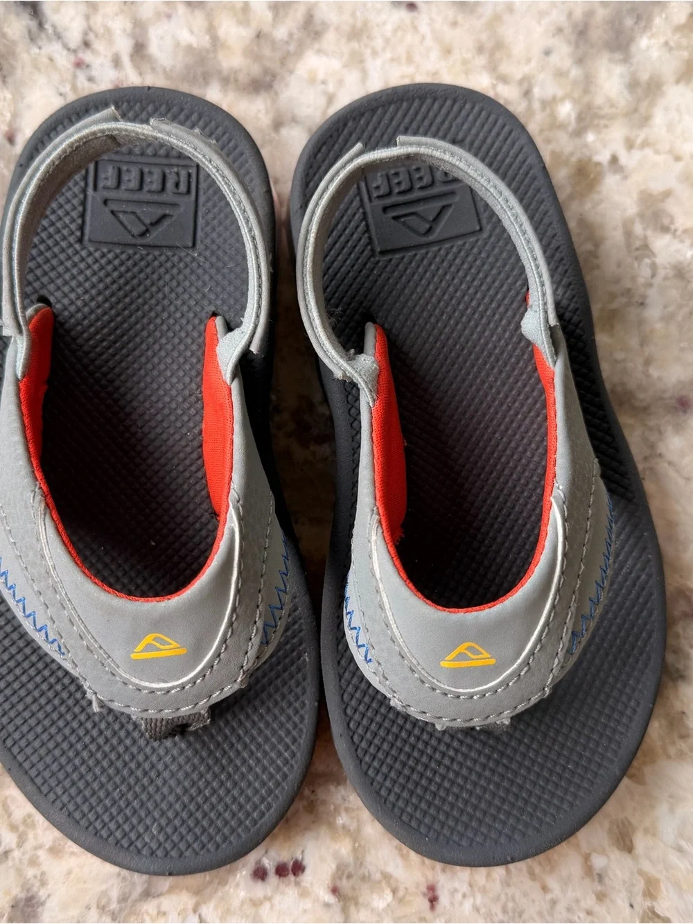 Reef Kids Grey and Orange Flip Flops with Yellow Logo