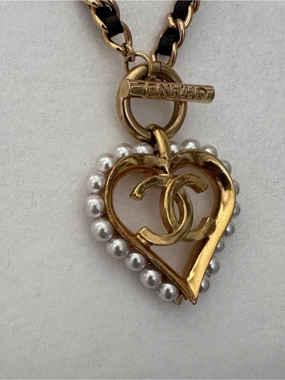 CHANEL gold tone