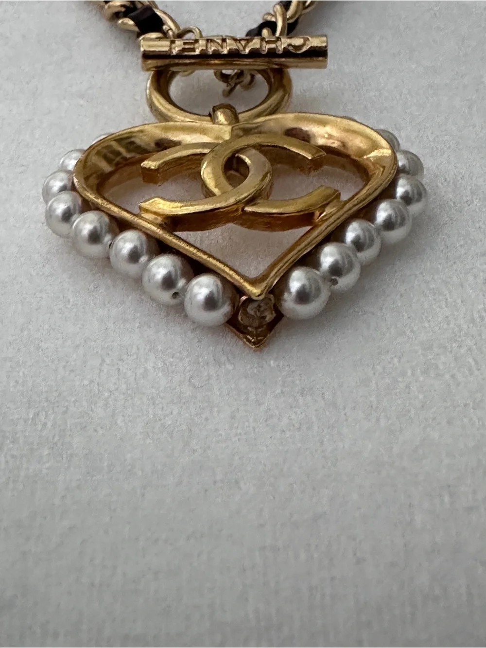 CHANEL gold tone