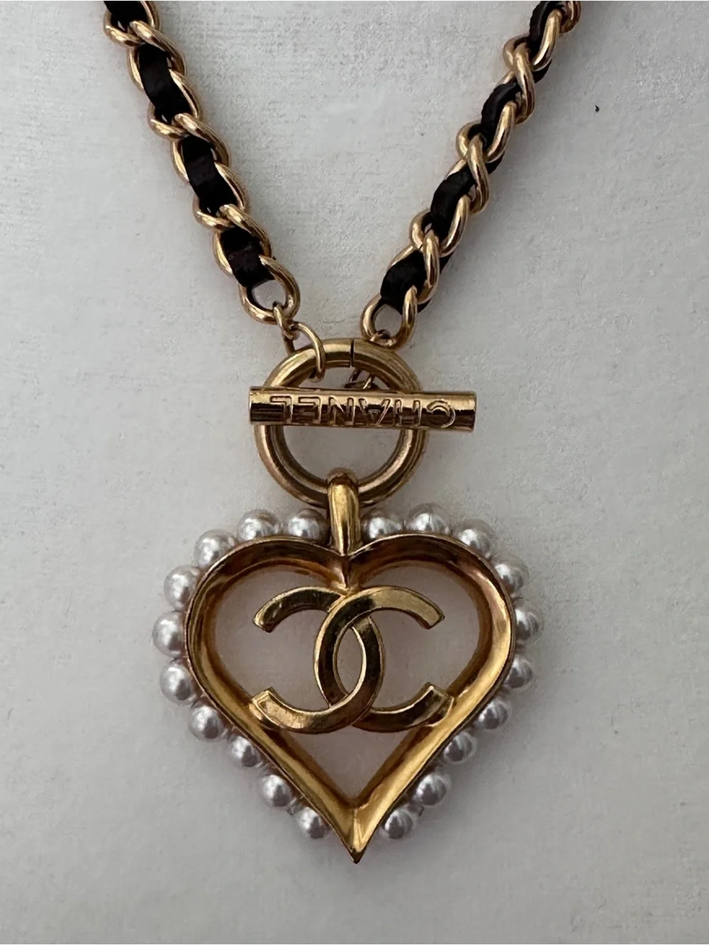CHANEL gold tone