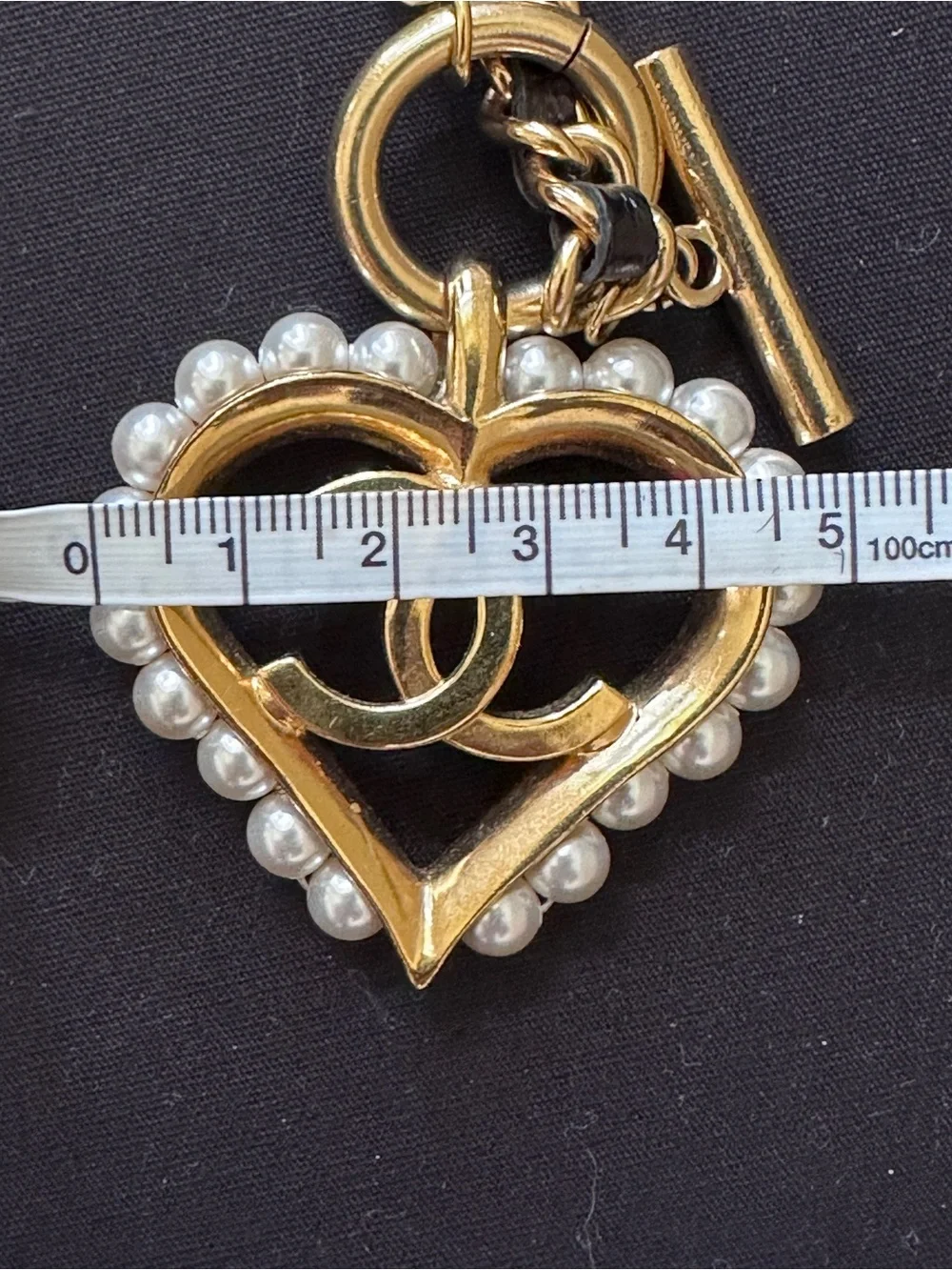 CHANEL gold tone