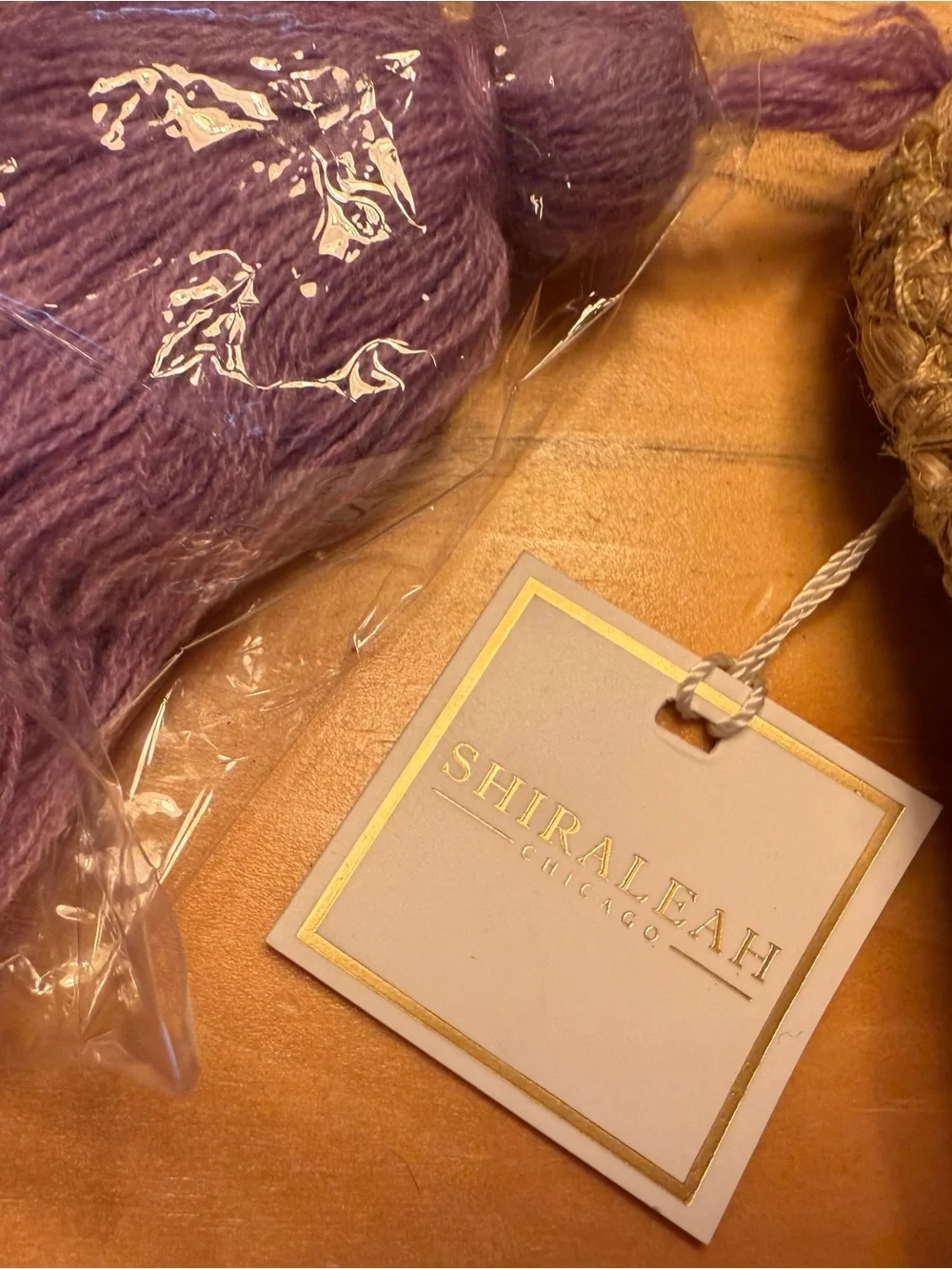Shiraleah Purple and Tan Knit Accessory with Gold-Trim Tag