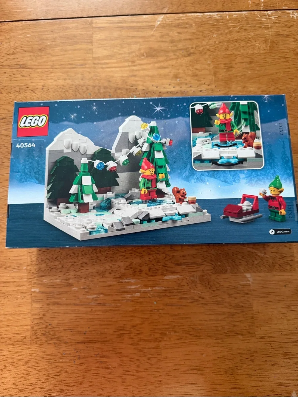 LEGO Winter Elves Scene with Red Sled and Green Trees