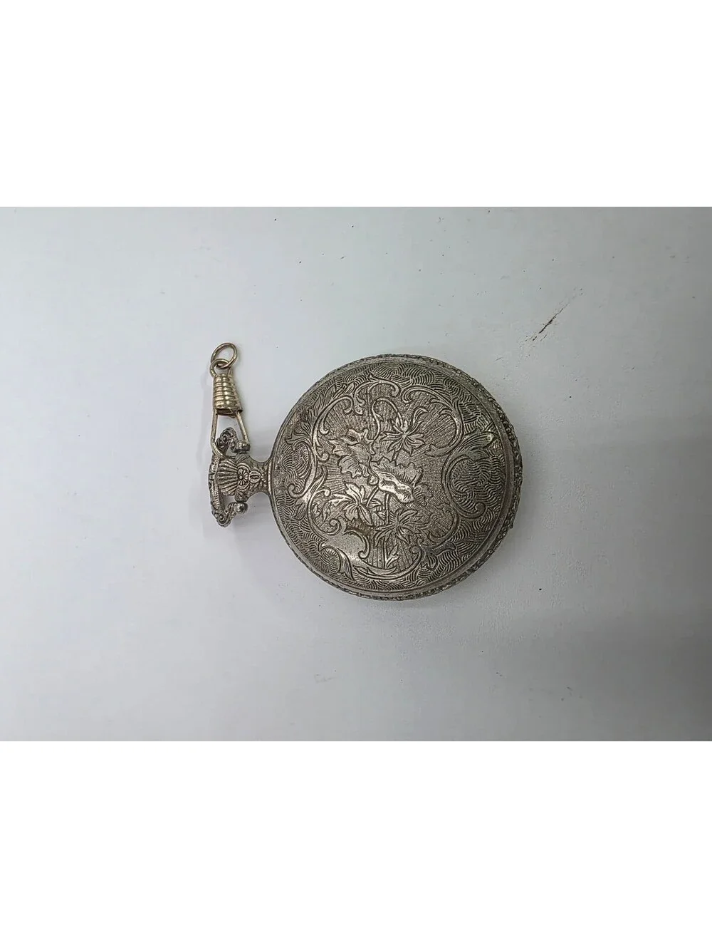 Vintage Geneva Silver Tone Pocket Watch with Ornate Design