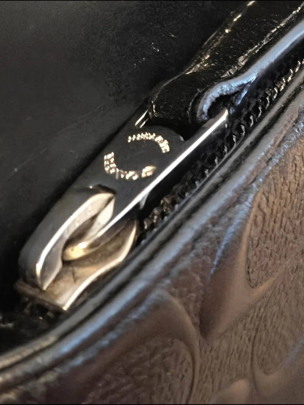 Coach zip signature