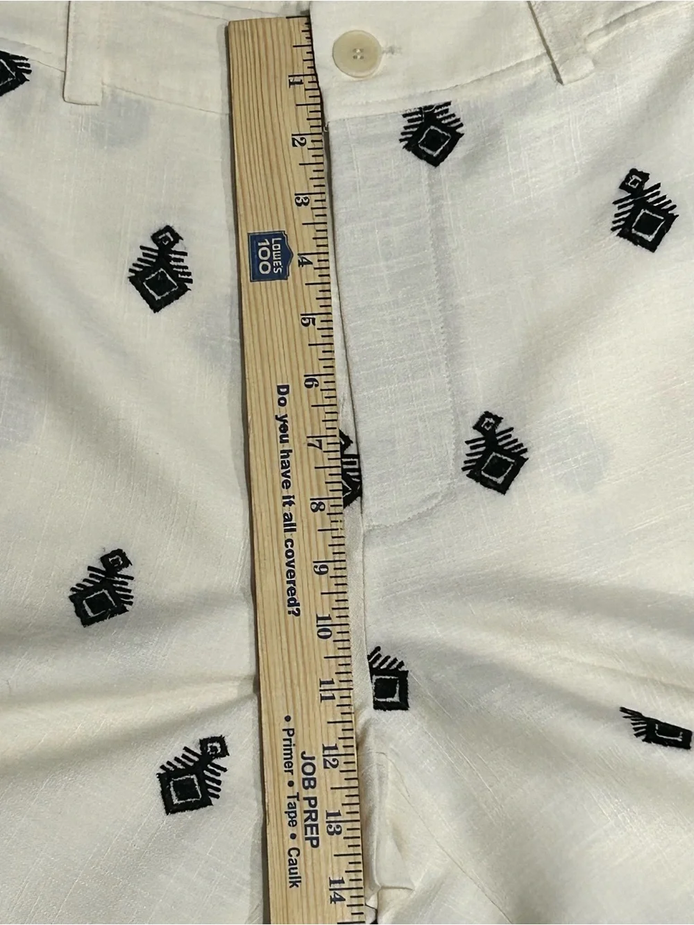 Zara tucked trousers over