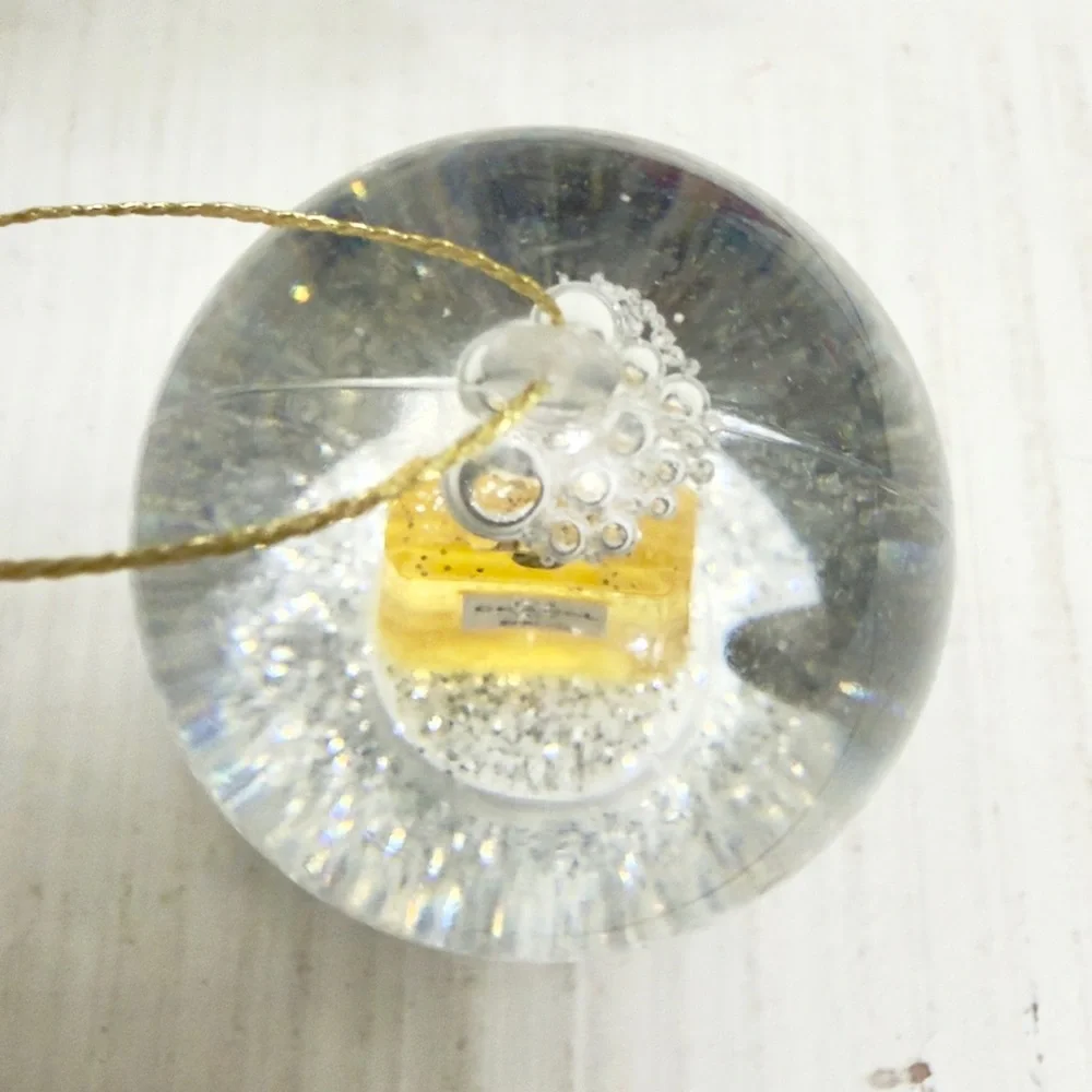 CHANEL snowglobe gold approx