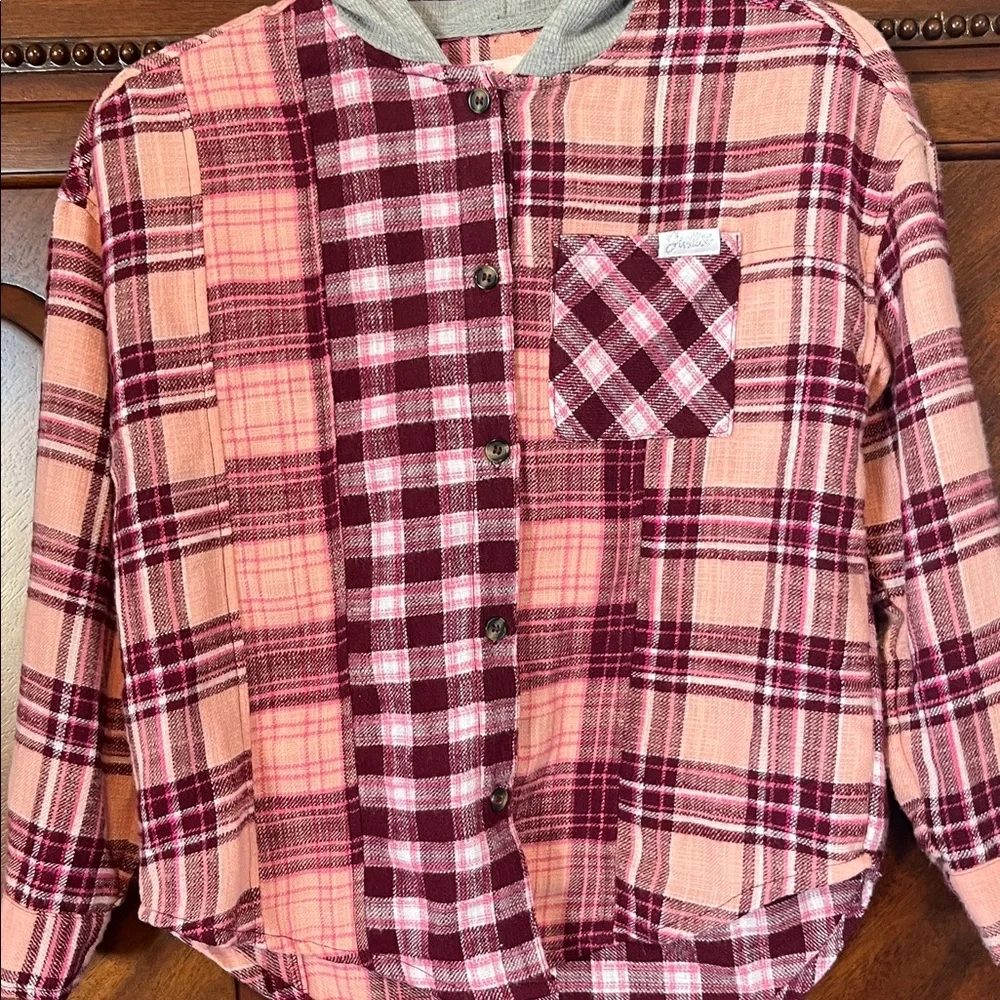 Justice button barely pocket