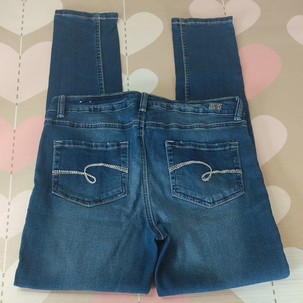Justice mid rise skinny jeans. Size 16 plus