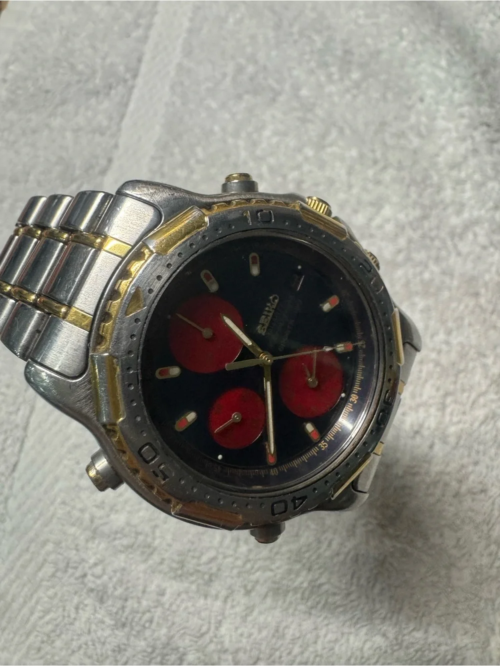 Seiko Navy Dial Chronograph with Red Subdials and Gold Accents