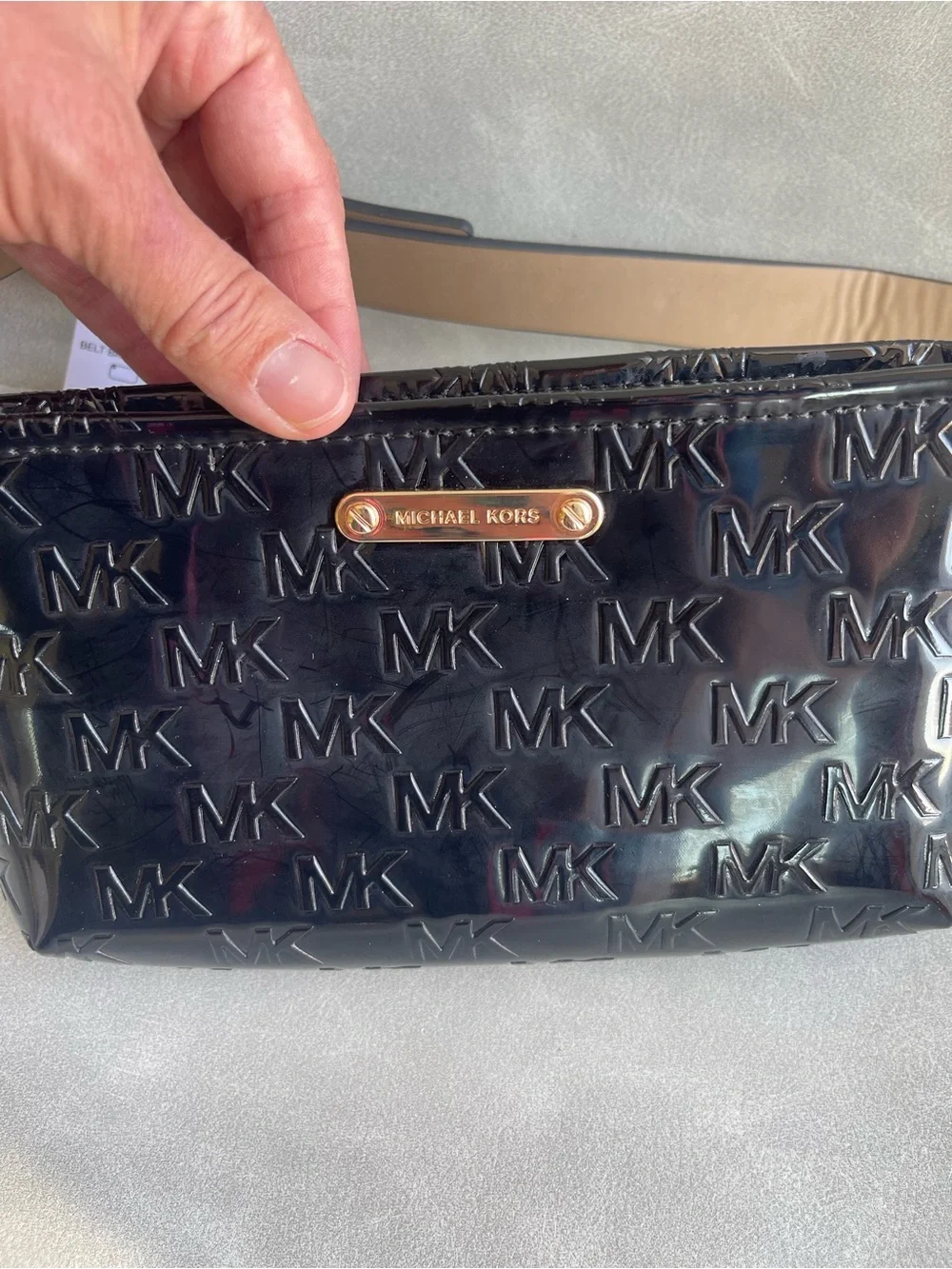 Michael Kors leather embossed hardware