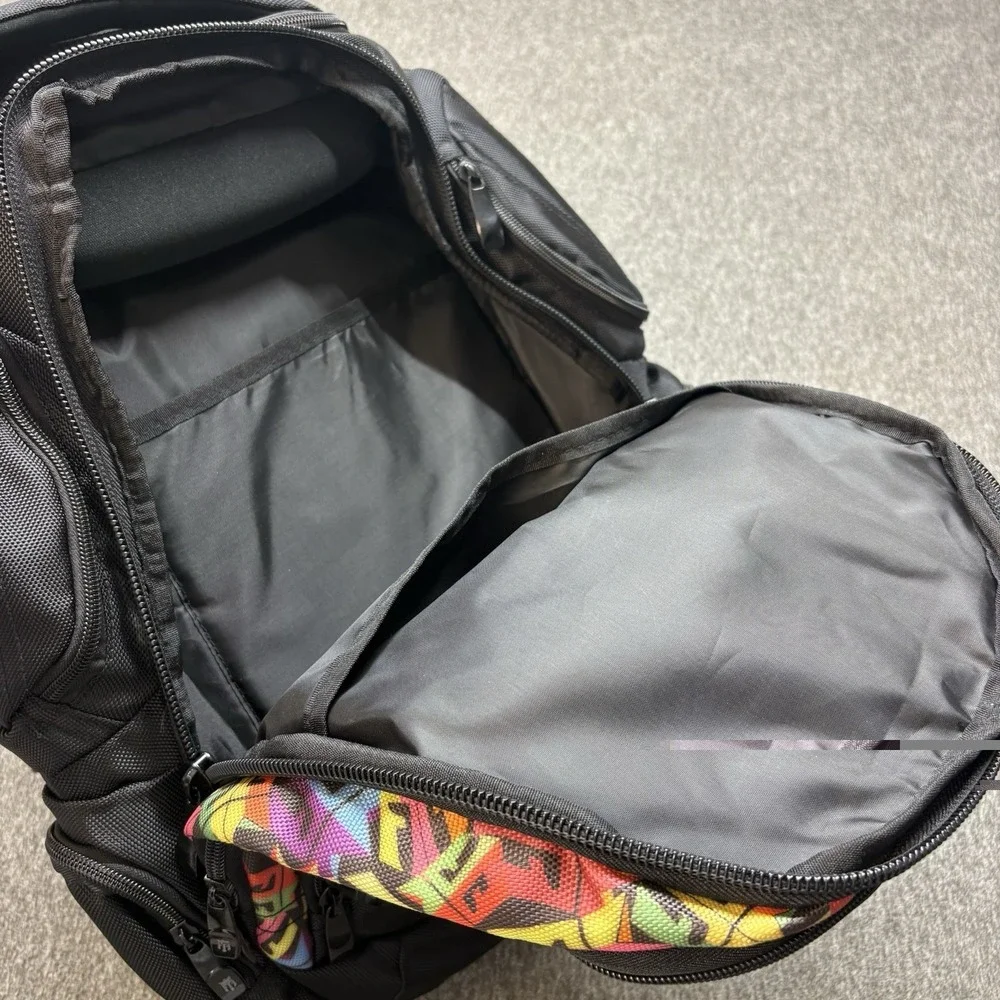 REIGN Total Body Fuel Backpack Black w/ Colorful Graffiti Accents‎ Multi Pocket