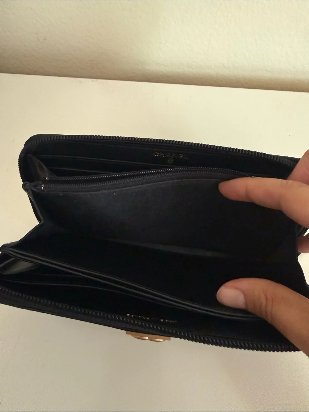 CHANEL Black Quilted Zip-Around Wallet with Gold CC Lock