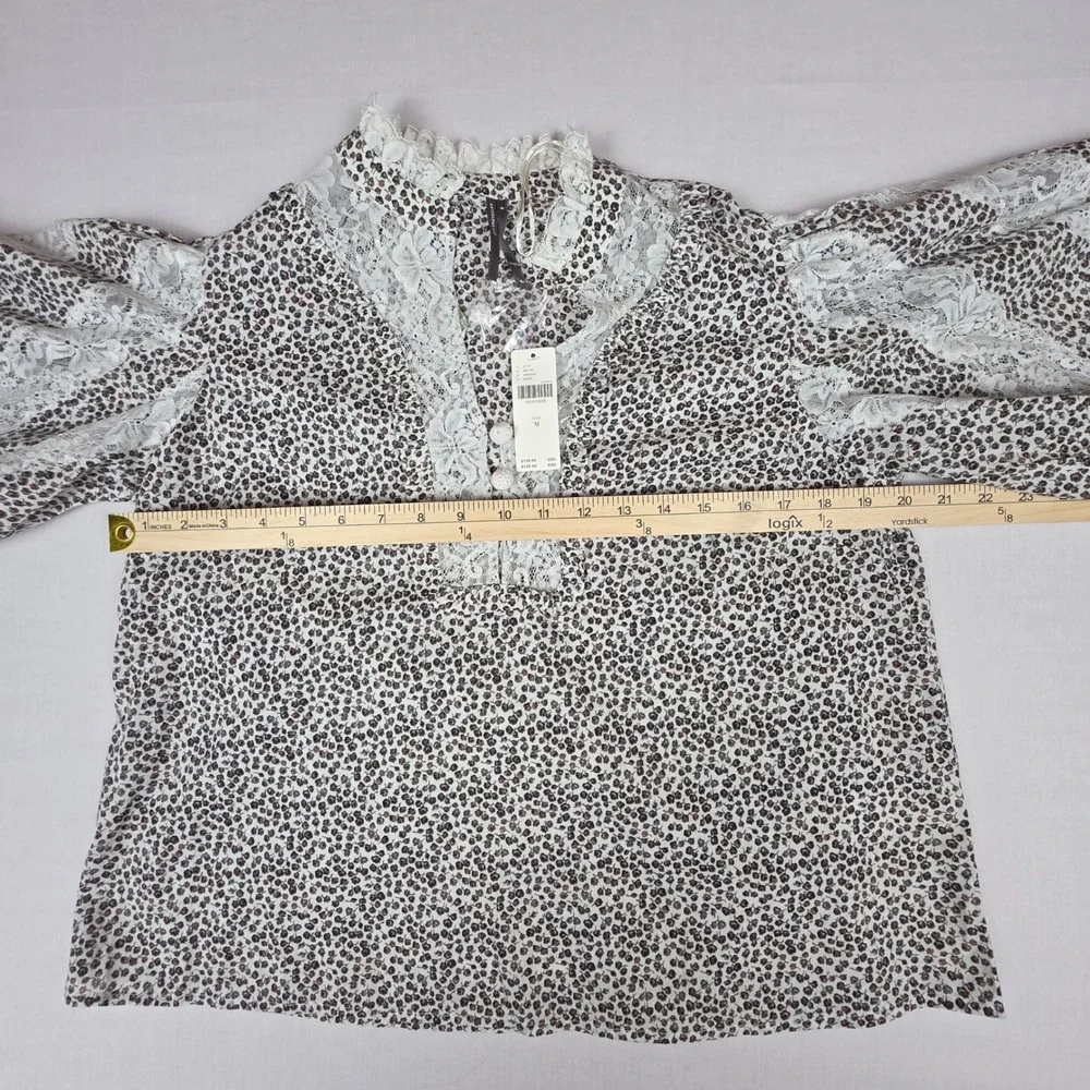 Anthropologie lace trimmed