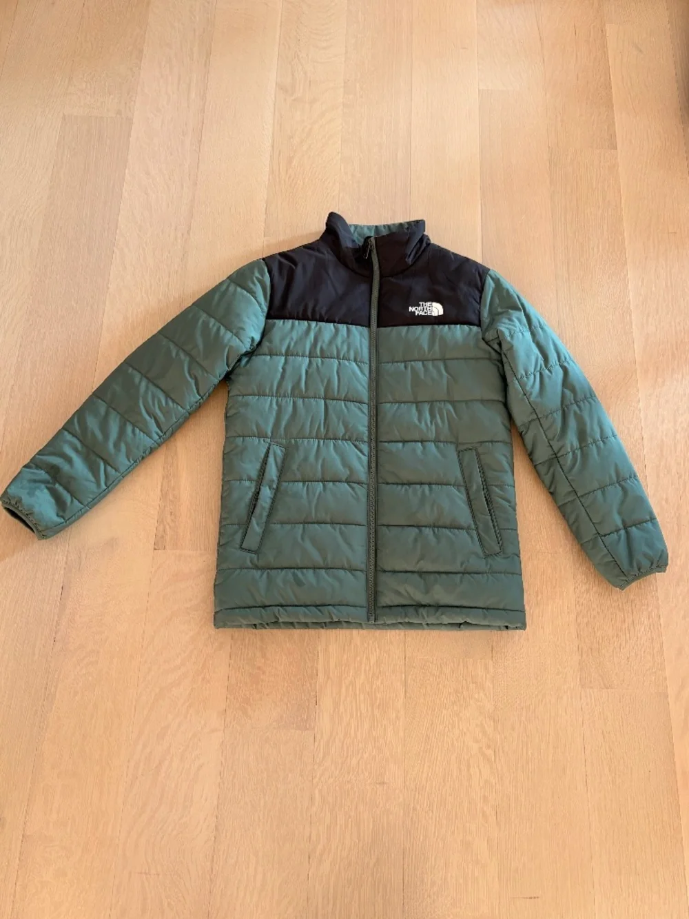 Green North Face Jacket