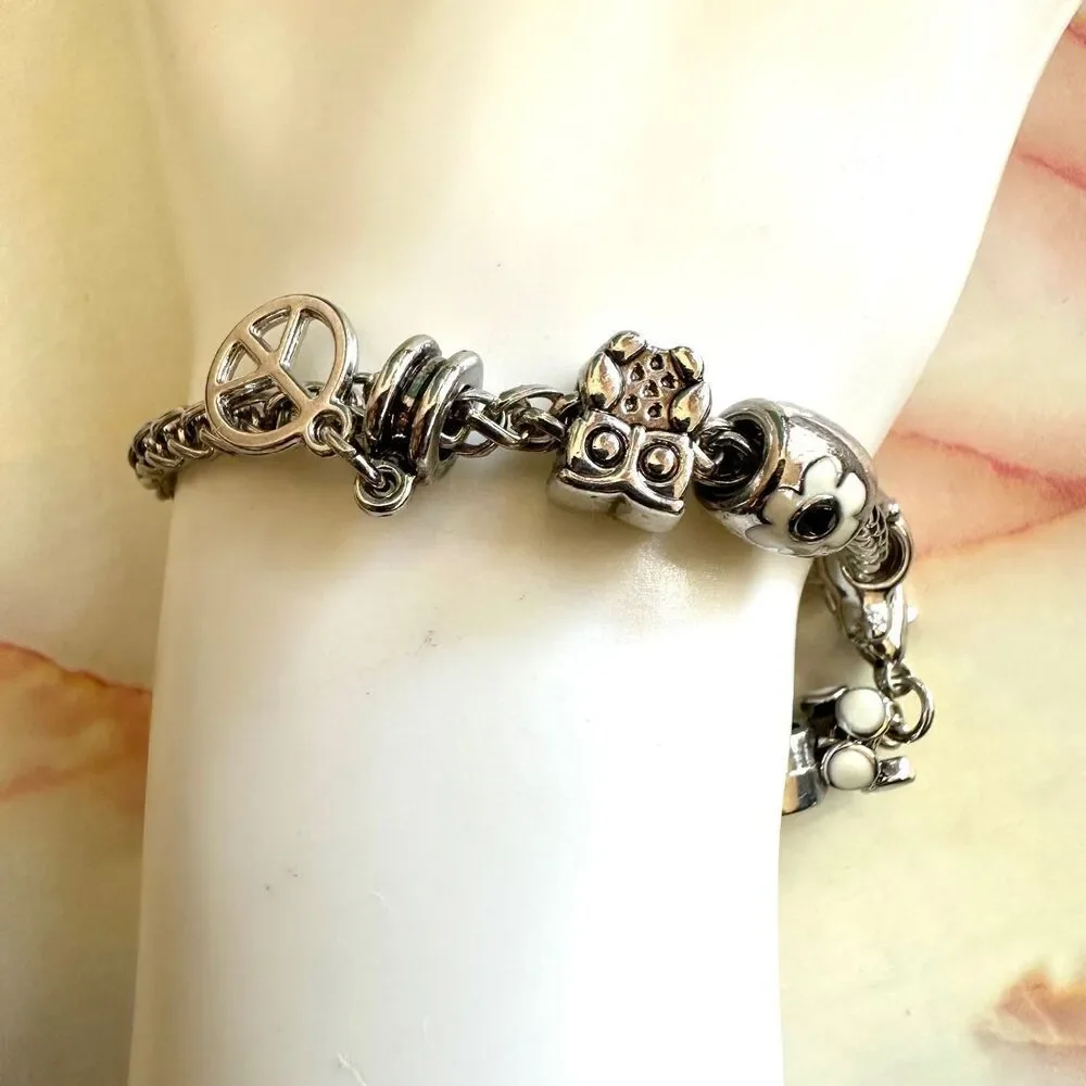 Silver tone bird flower peace owl charm bracelet