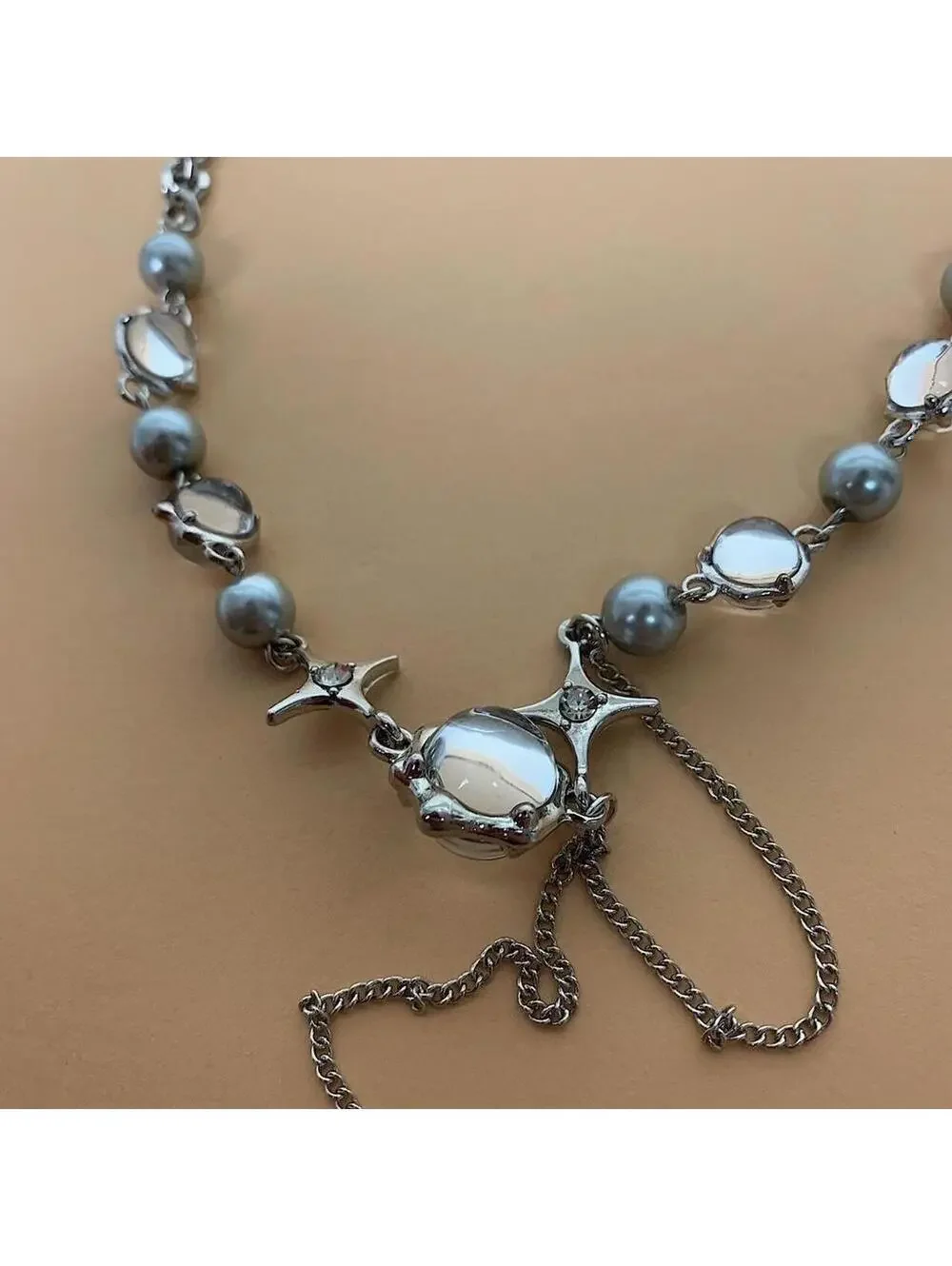 Cyber y2k grunge silver and beaded futuristic glass opal pendant necklace.