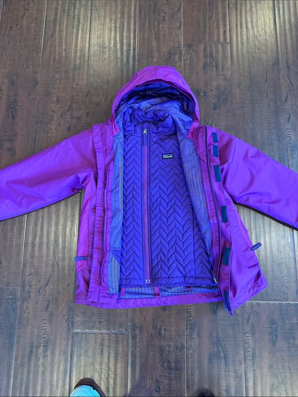 Patagonia Kids Purple Hooded Jacket with another removable jacket on the inside