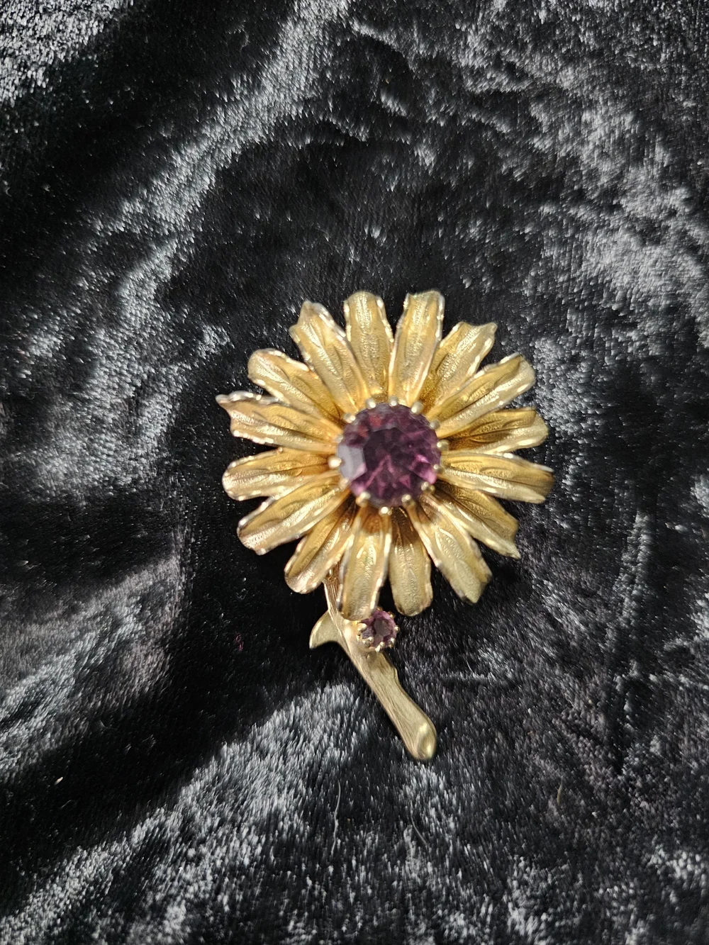 Gold Floral Brooch with Purple Gem Accent