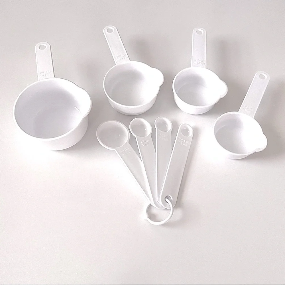 NWOT Set of 8 Pieces White Measuring Cups and Spoons