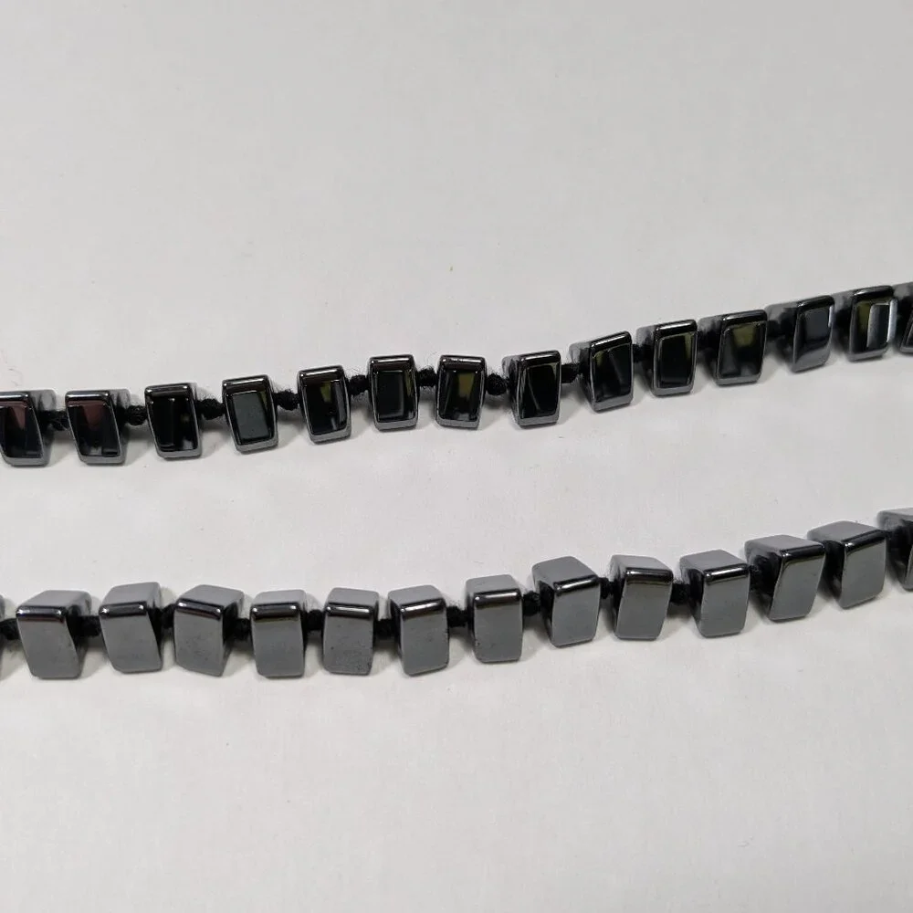 N/A black triangular