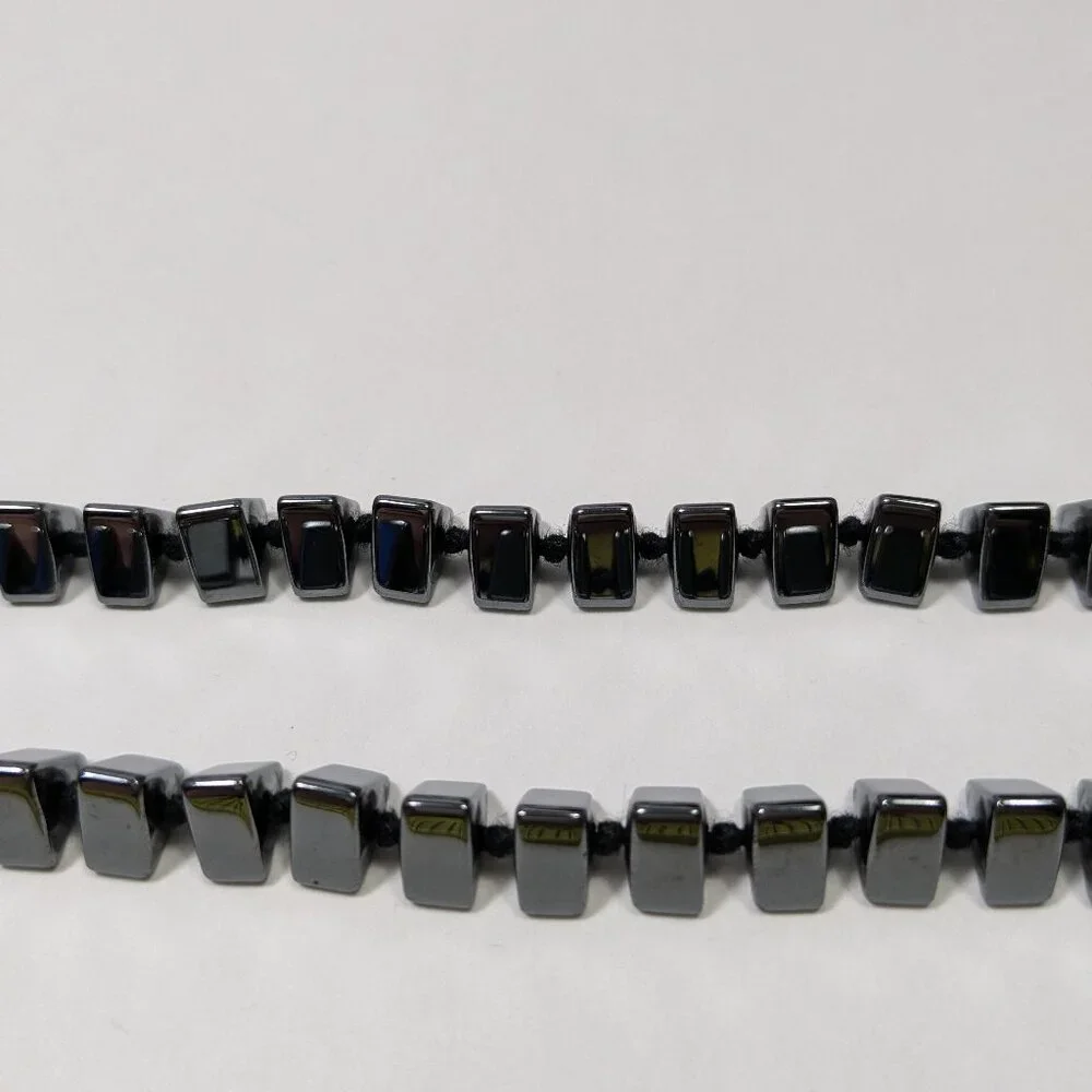 N/A black triangular